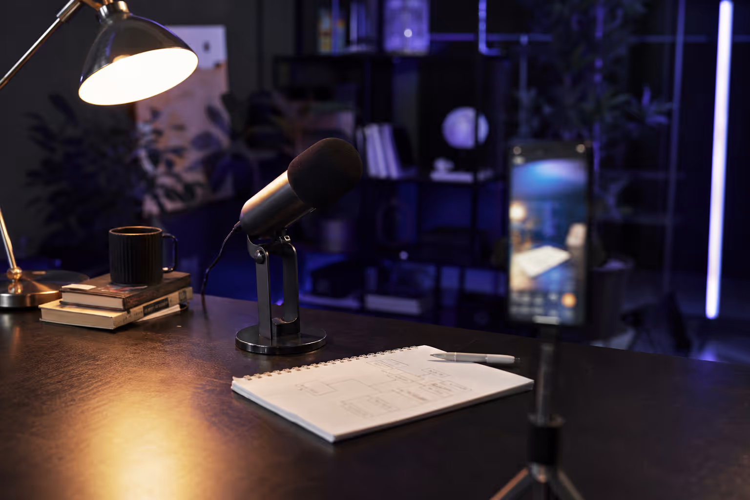 Photorealistic creator desk with microphone and smartphone for authority building